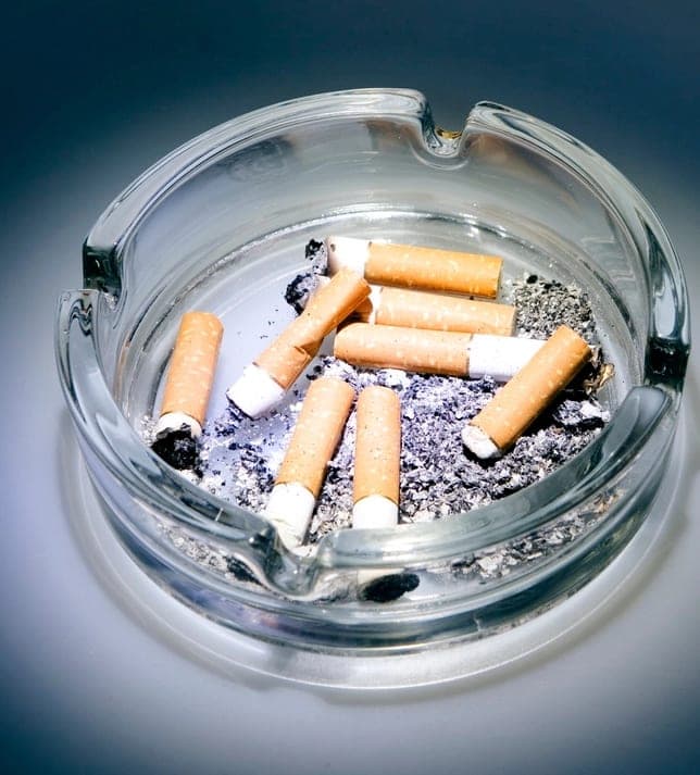 Ashtray full of cigarette butts